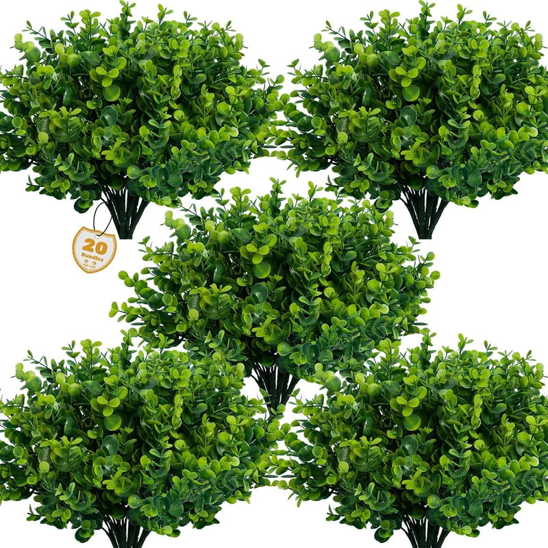 Artificial boxwood greenery plants with dense green leaves in black pots, outdoor style