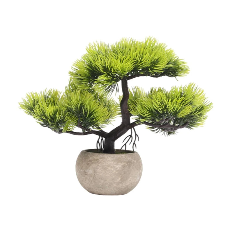 Artificial bonsai tree with green sculpted foliage in a gray stone pot