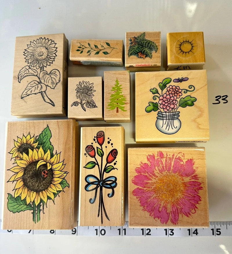 Floral crafting stamp set of wooden blocks with sunflower, rose, and leaf designs