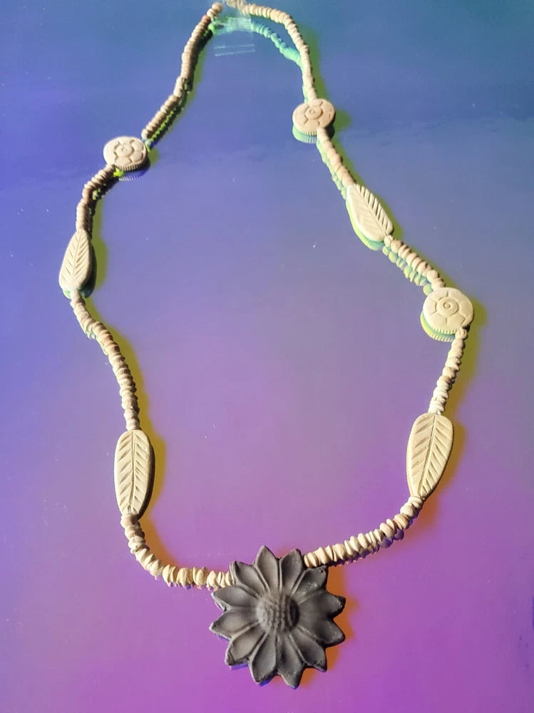 Natural clay bead necklace with sunflower pendant and leaf-shaped beads