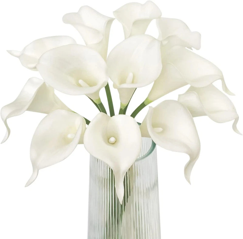 White artificial calla lily bouquet with multiple blooms and green stems