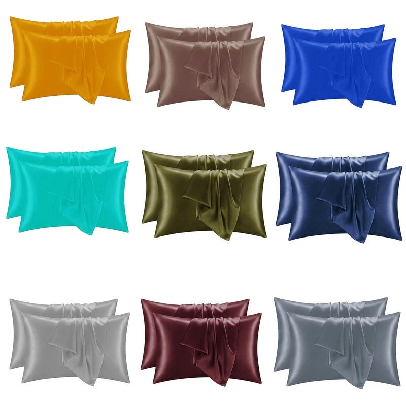 Satin solid pillow sham with center knot detail, shown in multiple colors