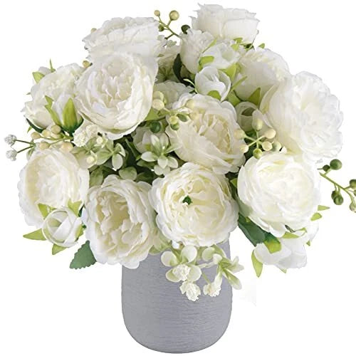 White faux peony and small greenery bouquet in a gray round vase
