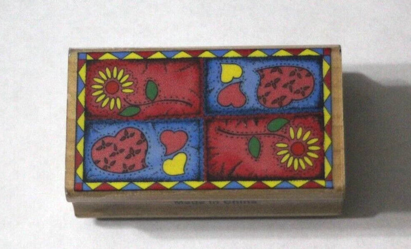Rectangular rubber stamp with patchwork hearts and sunflower designs in red, blue, yellow
