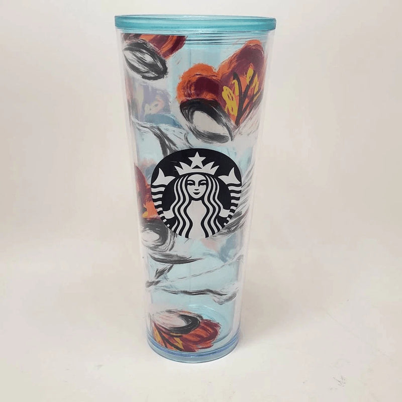 Starbucks venti tumbler with peony floral print, clear double-wall cup, no lid or straw