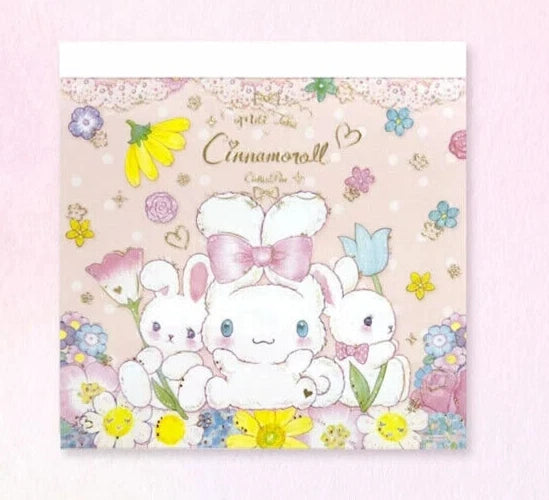 Pastel bouquet memo pad with Cinnamoroll and bunny characters among flowers