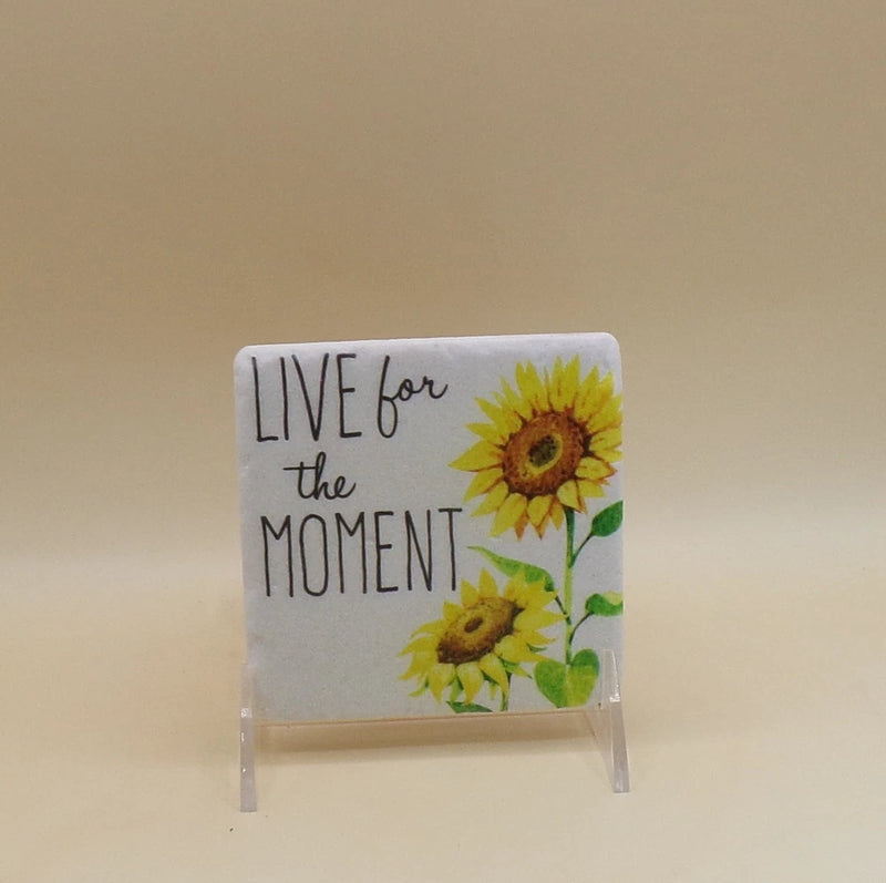 Square ceramic coaster with sunflower art and 'LIVE for the MOMENT' text