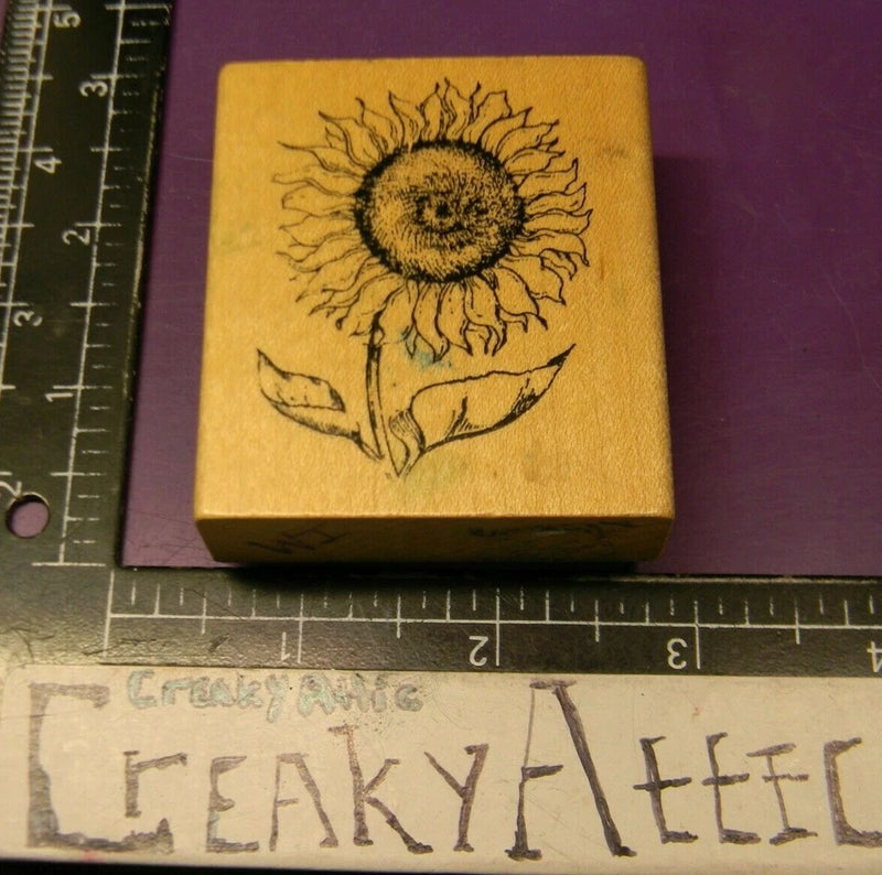 Sunflower rubber stamp with long stem flower on square wooden handle