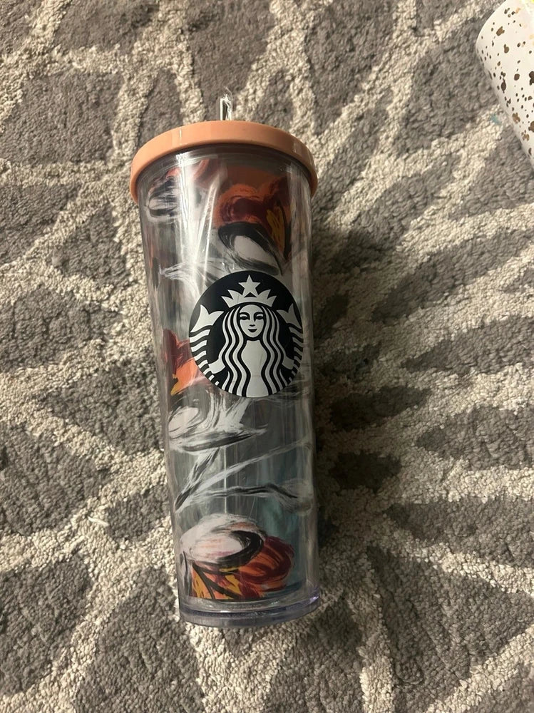 Starbucks venti tumbler with clear body, black lid, orange floral peony print