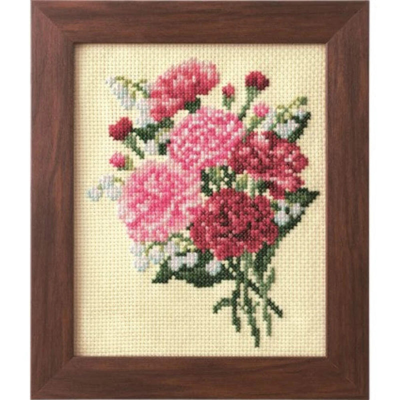 Framed cross-stitch flower arrangement with pink carnations and small green leaves
