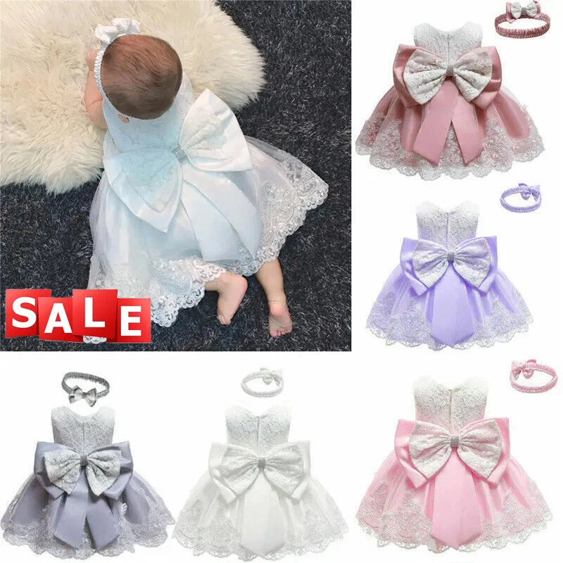 Kids tulle party dress with large bow detail and layered tulle skirt