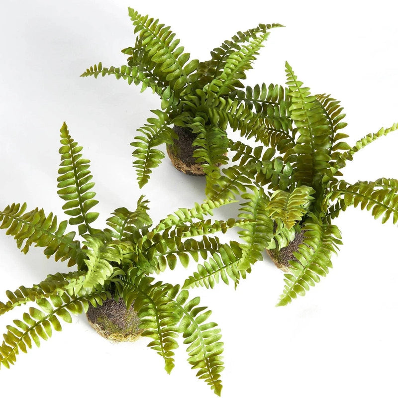 Artificial green fern drop-in plants with faux soil bases and layered fronds