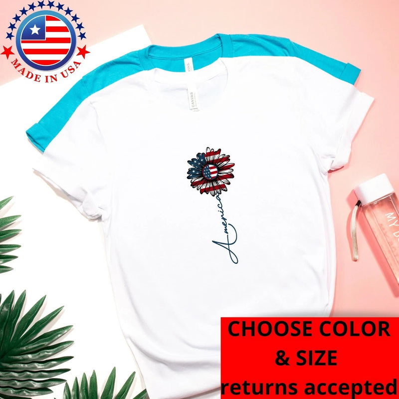 White short-sleeve T-shirt with dark red and blue flower graphic and cursive print