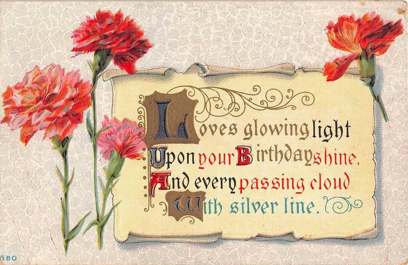Vintage art nouveau postcard with red carnations and birthday scroll motto text