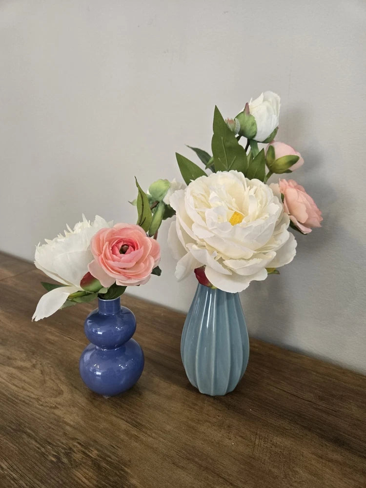 Set of 2 flower arrangements in vintage vases, white and pink blooms in blue vases