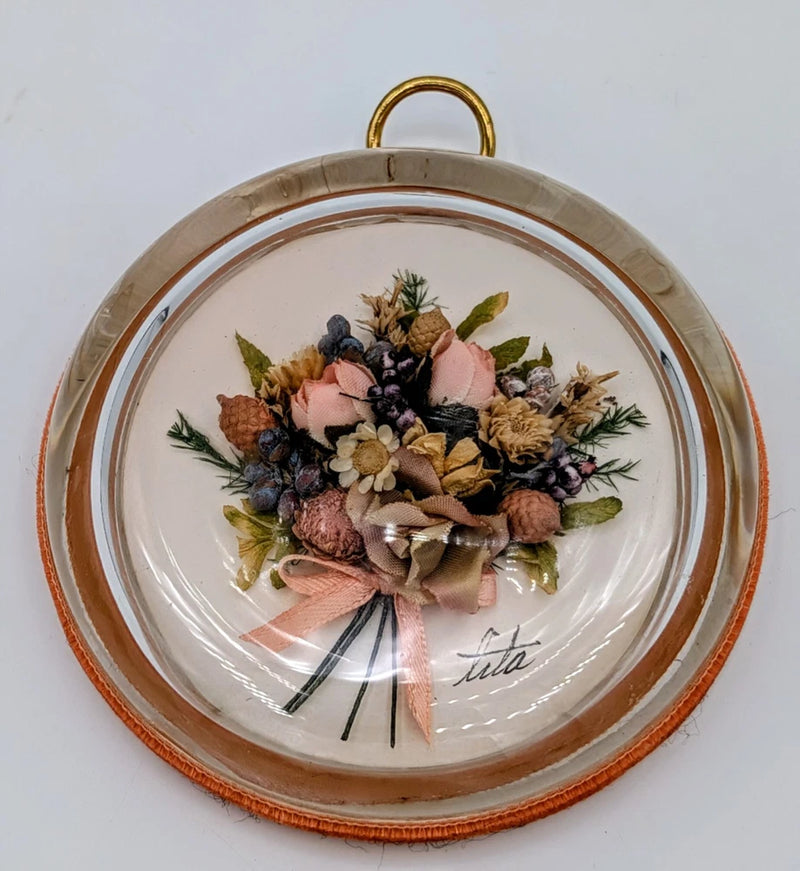Glass dome dried flower keepsake on apricot velvet with gold-tone hanging loop