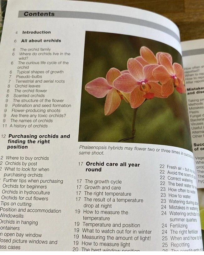 Orchids book, open page showing orchid photo and contents list