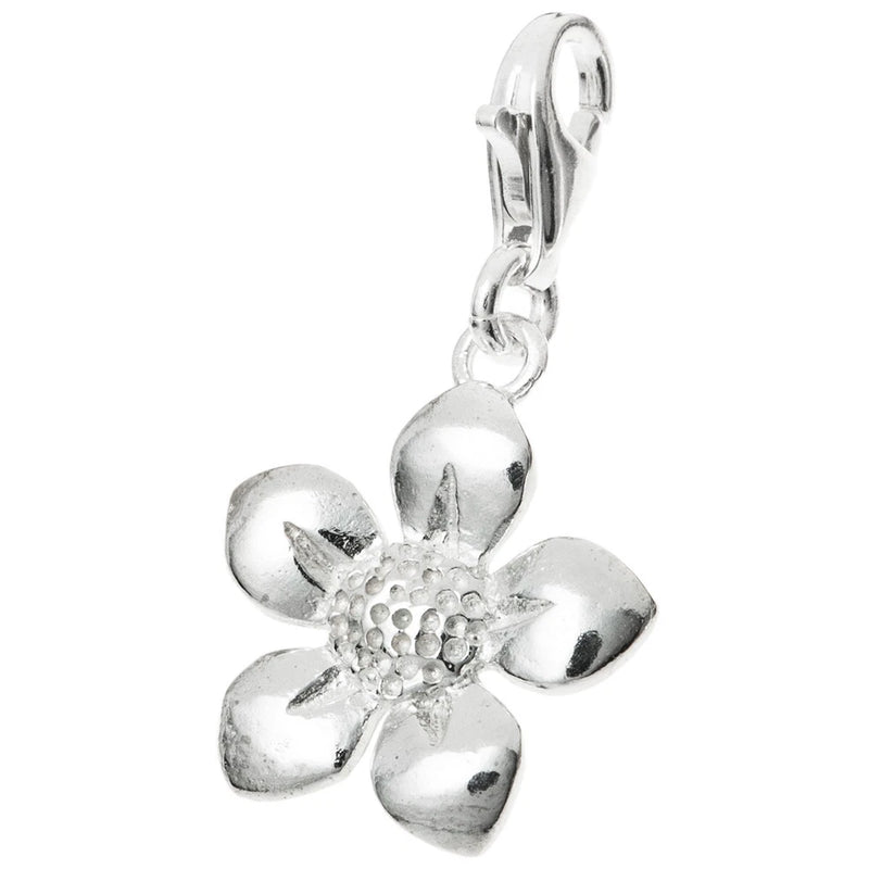 Sterling silver flower dangle charm with textured center and loop clip top