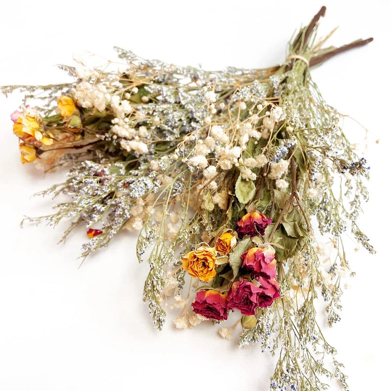 Dried rose spray bouquet with yellow, orange, and pink mini blooms and airy preserved foliage