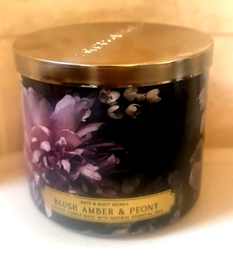 Bath & Body Works Blush Amber & Peony 3-wick scented candle in a glass jar, gold lid