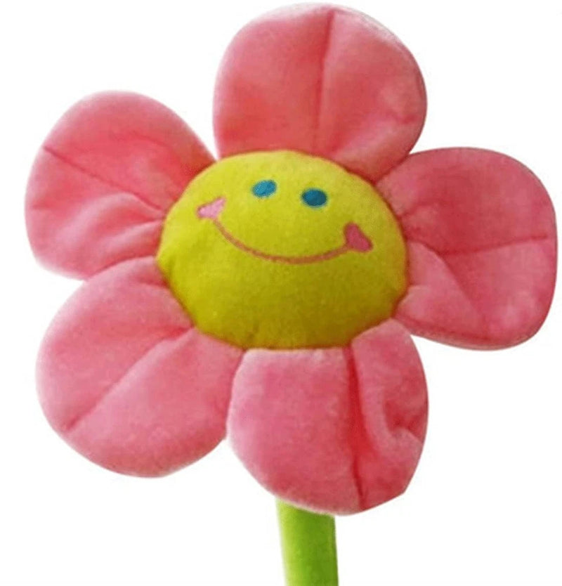 Plush artificial flower with pink petals, green smiley center, and bendable stem
