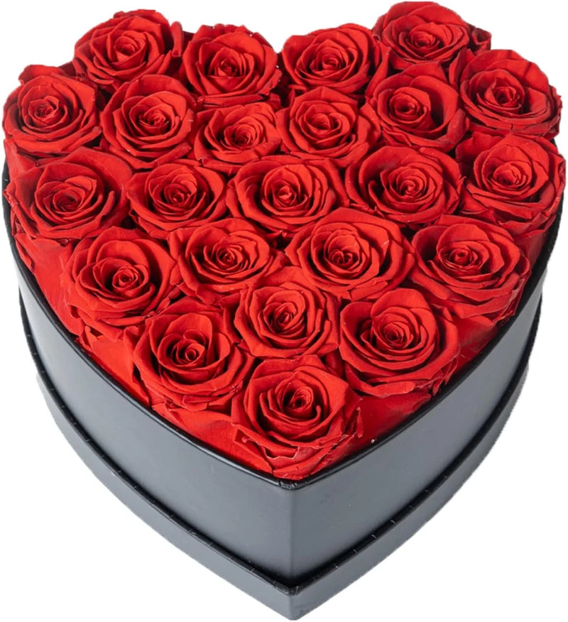 Heart-shaped gift box with red preserved roses arranged in a full flower heart