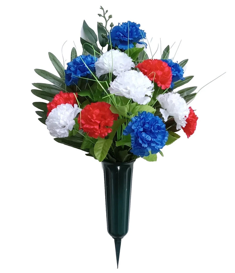 Memorial carnation potted flower arrangement with red, white, and blue blooms and green leaves