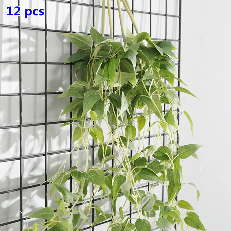 Artificial clematis-style hanging vine with green leaf clusters, 12-pack