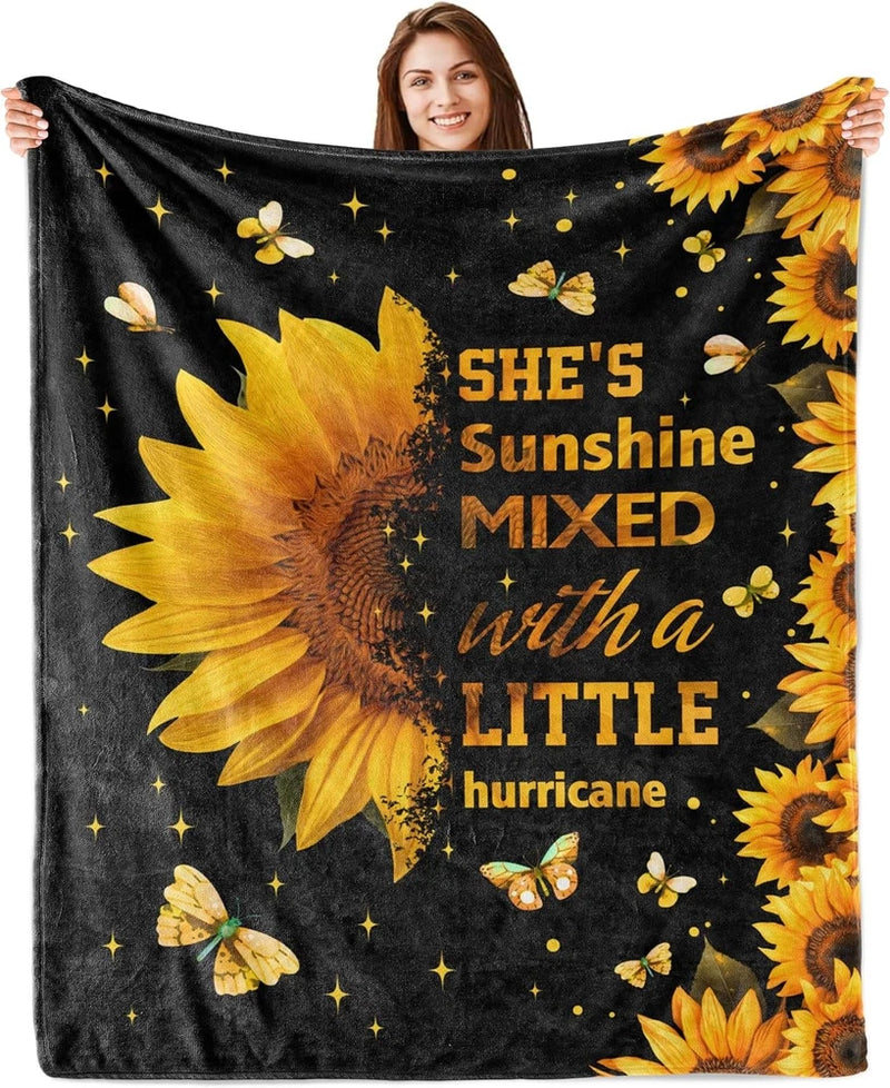 Sunflower graphic throw blanket, black with yellow sunflowers, butterflies, and phrase text.
