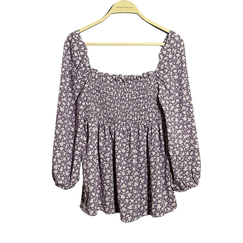 Women’s purple floral smocked blouse with gathered waist and long puff sleeves
