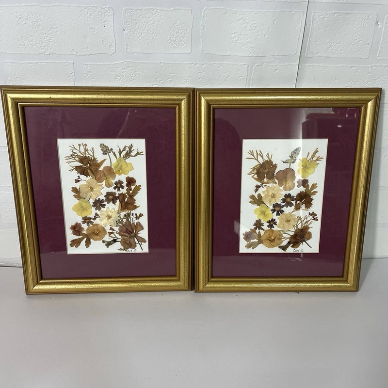 Set of 2 framed dried pressed flowers with gold frames and botanical arrangement
