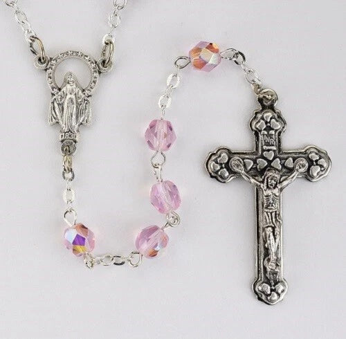 Silver rosary necklace with pink faceted beads and crucifix charm