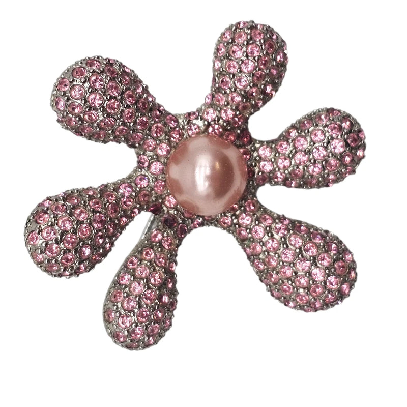 Pink crystal flower brooch pin with pearl-like center and five jeweled petals