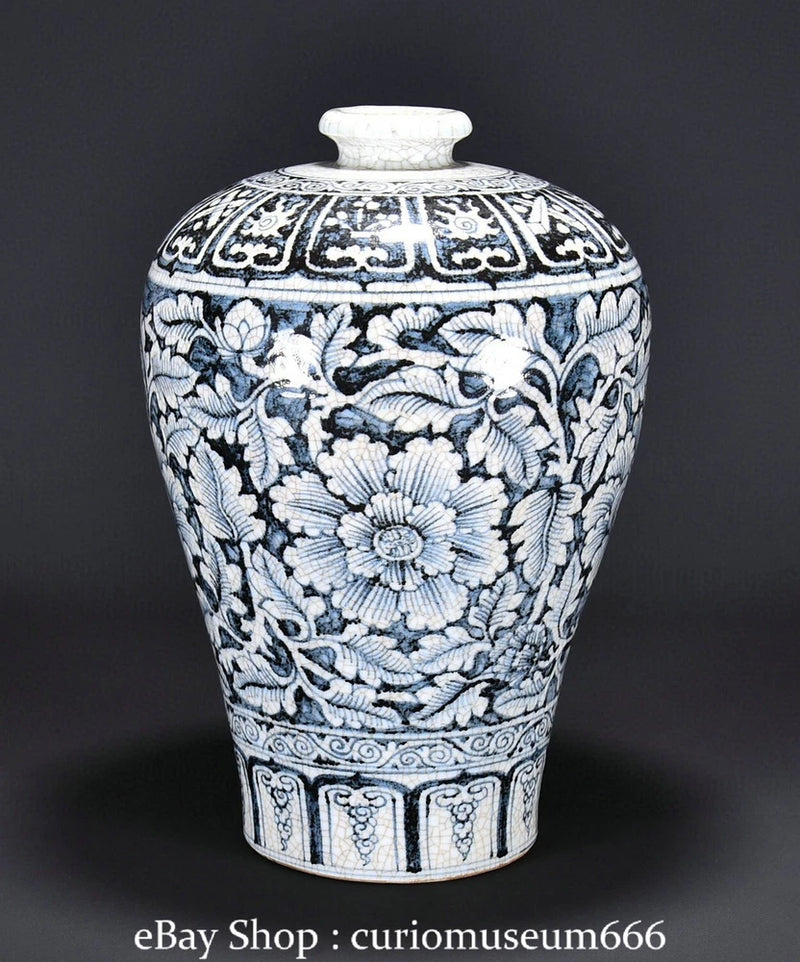 Blue-and-white porcelain peony vase with lid, floral pattern and decorative border.