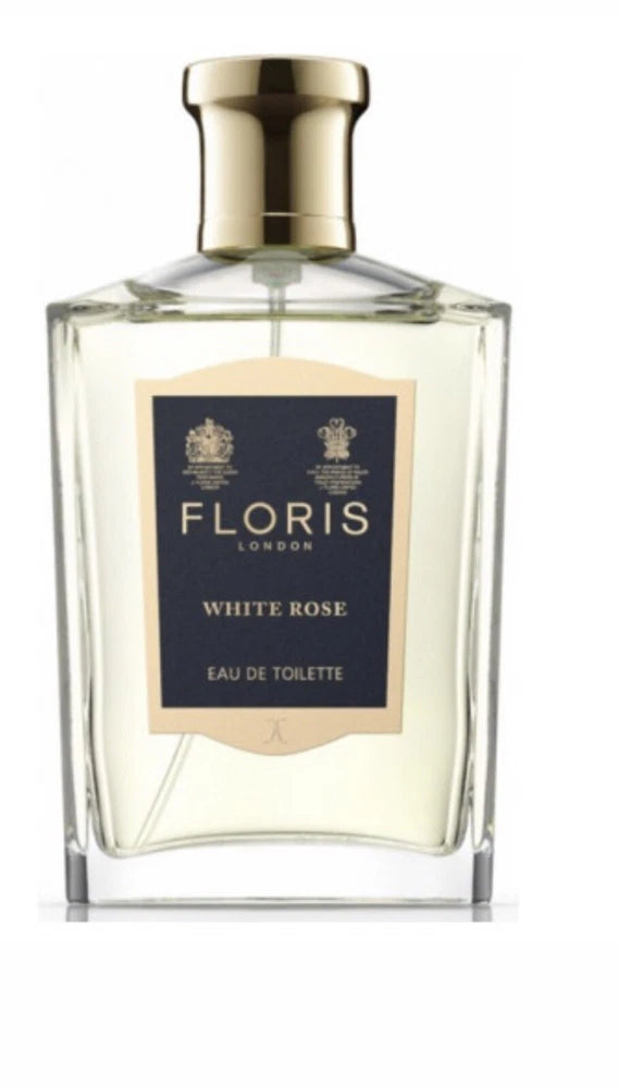 Floris White Rose eau de toilette bottle, clear glass with gold cap and navy label