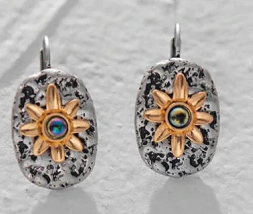 Gold sunflower stone drop earrings with black and white speckled oval stones