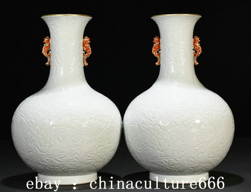 Pair of white porcelain peony double-ear vases with orange-gold side handles