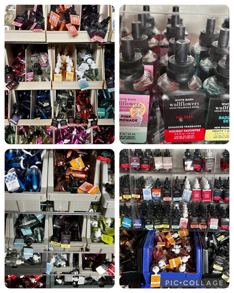 Assorted Wallflowers fragrance refill bottles displayed on retail shelf