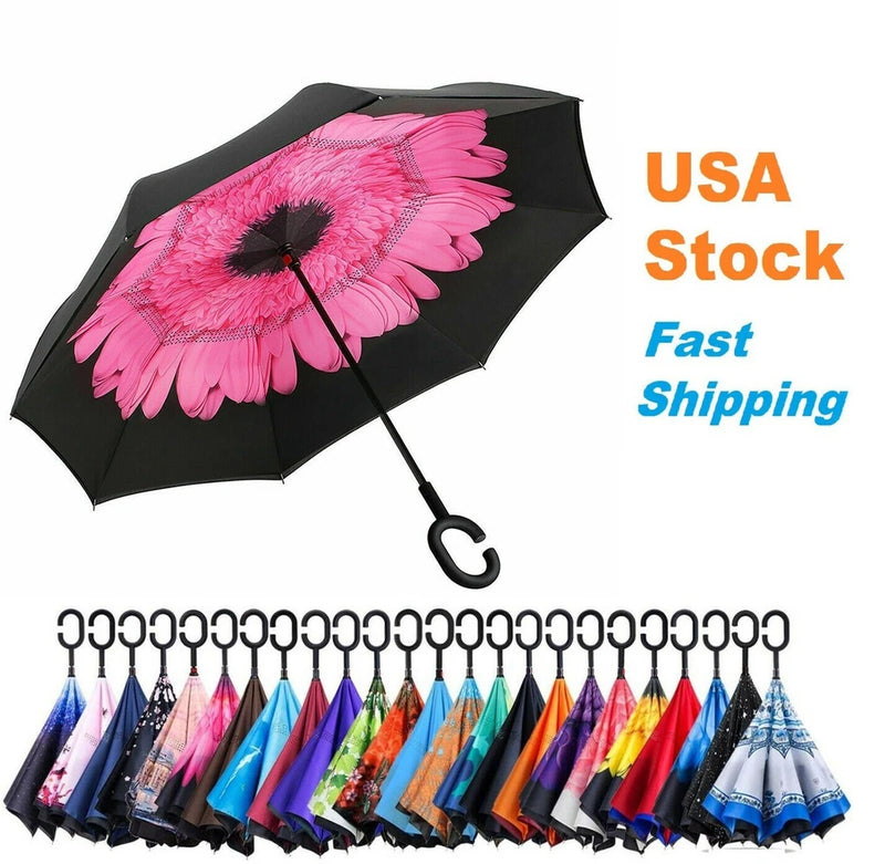 Black umbrella with pink flower print and C-shaped hook handle
