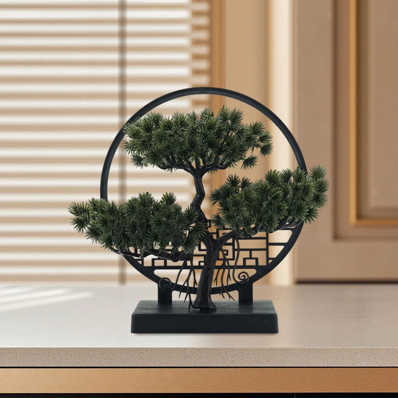 Artificial bonsai tree desktop ornament with green foliage on black base and ring frame
