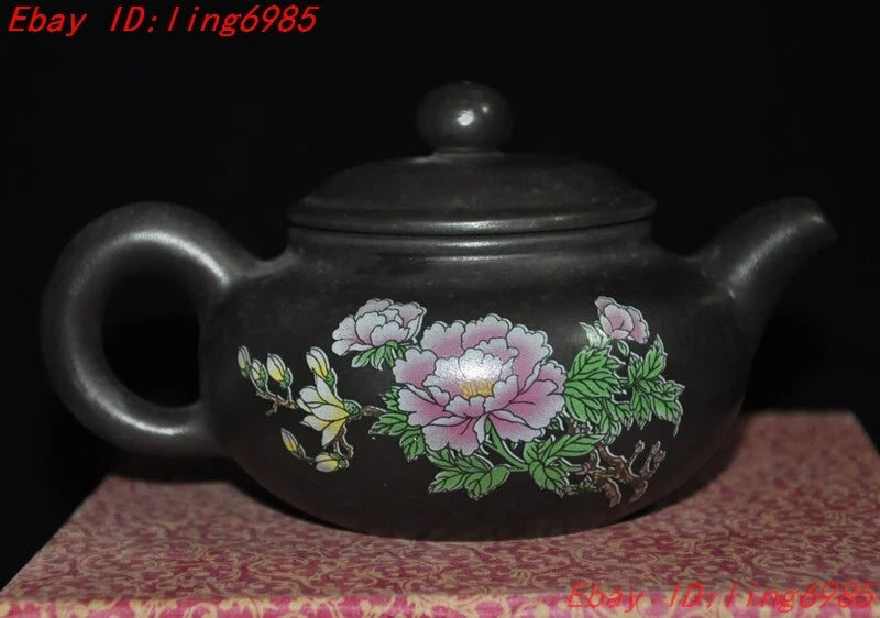 Dark gray ceramic teapot with peony floral painting, curved spout and two side handles