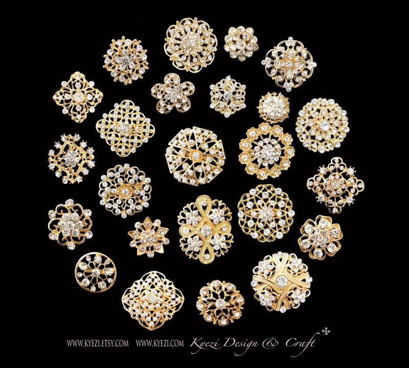 Assorted alloy rhinestone crystal brooches, round and floral designs, gold-tone set
