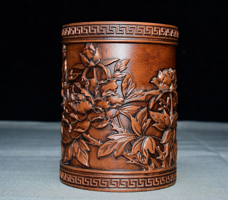 Carved peony flower brush pot with dark brown leaf and floral pattern, round design