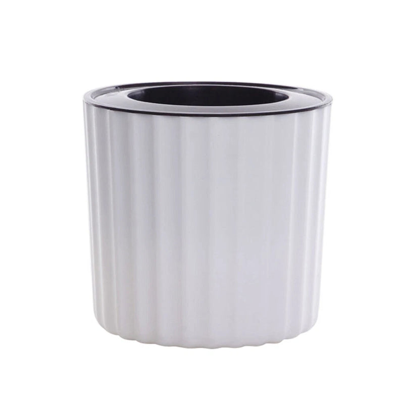 Light gray ribbed plastic planter pot with wide round opening