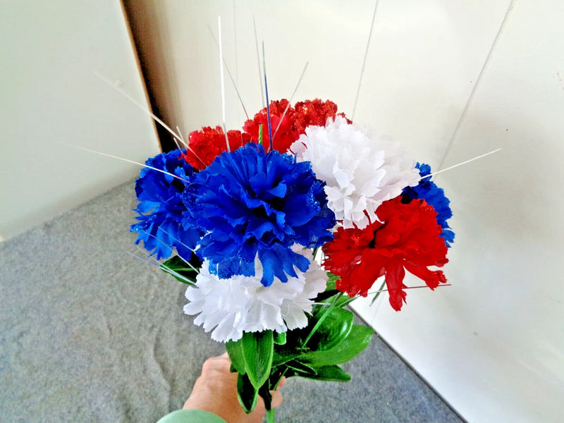 Artificial silk carnation flower stem bush with red, white, and blue blooms