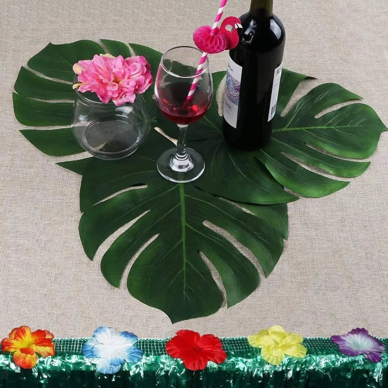 Green faux tropical leaves with large split leaf design for decorative plant use