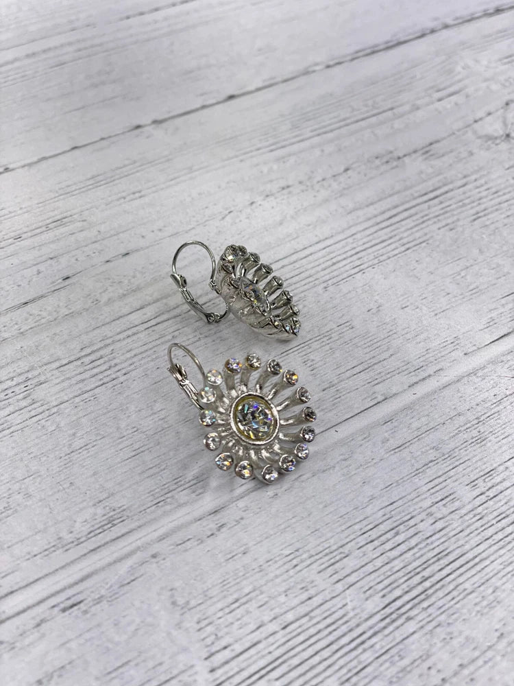 Clear rhinestone sunflower drop earrings with circular center and silver-tone hooks