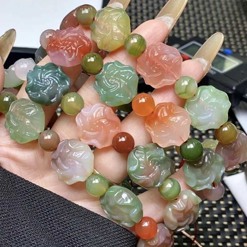 Translucent jade peony flower bead elastic bracelet with mixed green, pink, and orange beads