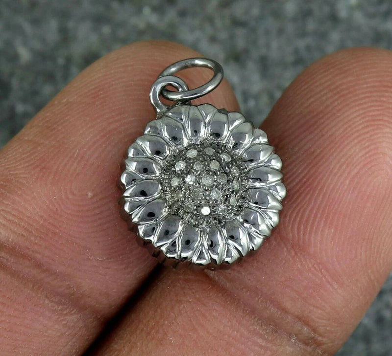 Silver sunflower pendant with pave stones and loop bail