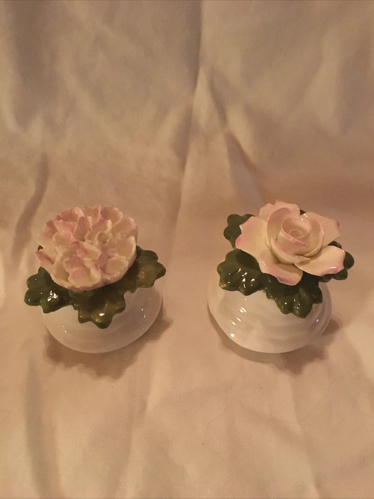 Fine bone china salt and pepper shakers with pink flower lids and green leaf accents